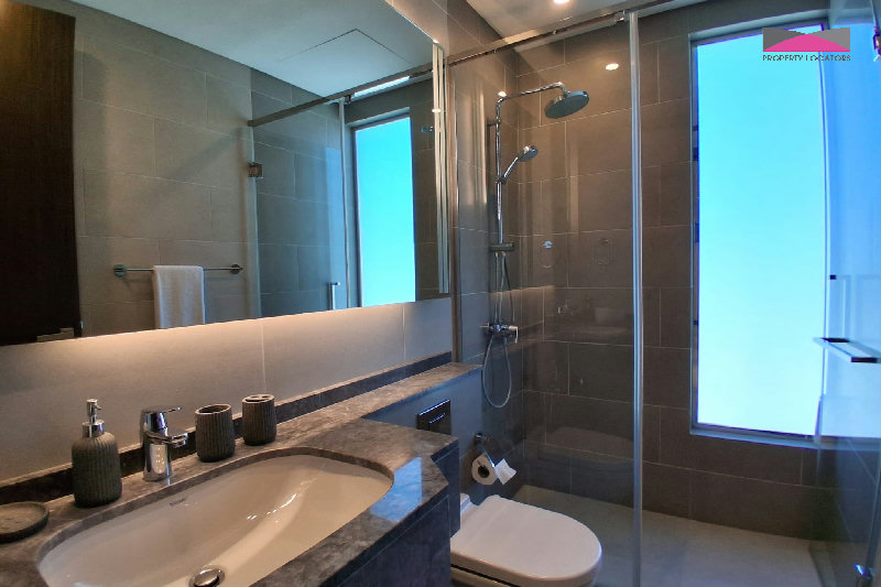 Stylish Seef Sanctuary | Elegant 1.5-Bedroom Living with City and Sea Views β Slide 5