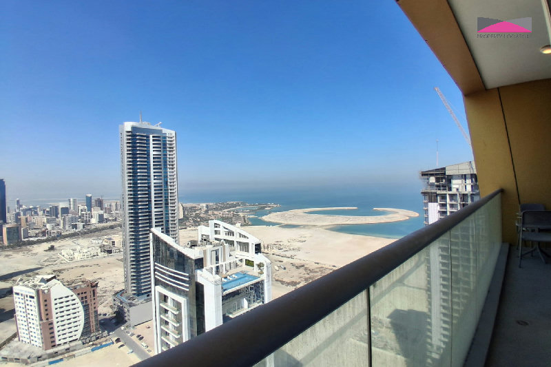 Stylish Seef Sanctuary | Elegant 1.5-Bedroom Living with City and Sea Views β Slide 10