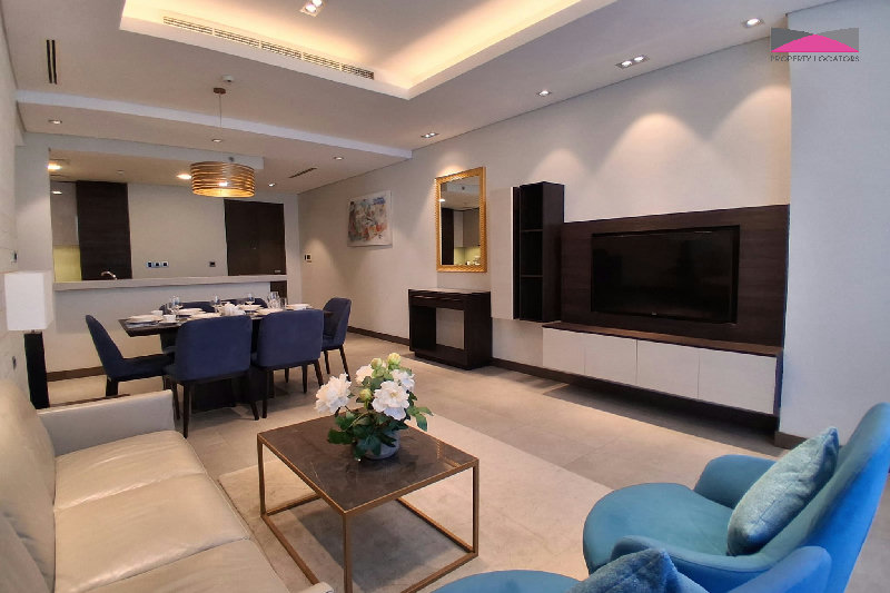 Stylish Seef Sanctuary | Elegant 1.5-Bedroom Living with City and Sea Views β Slide 1