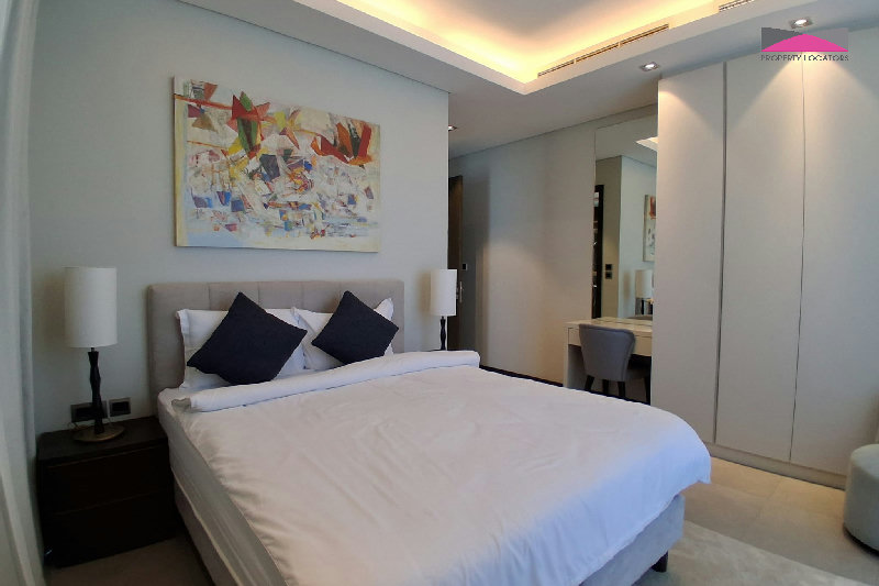 Stylish Seef Sanctuary | Elegant 1.5-Bedroom Living with City and Sea Views β Slide 7