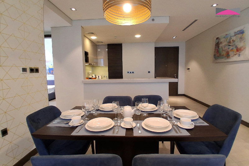 Stylish Seef Sanctuary | Elegant 1.5-Bedroom Living with City and Sea Views β Slide 3