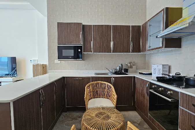 Lavish 1BR | Balcony | Semi‑Open Kitchen | Internet Included| Premium Facilities - View 3