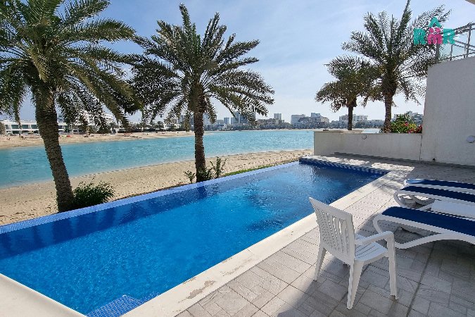 Tranquil Beach Compound with Turquois Views and Swimming Pools โ Slide 1